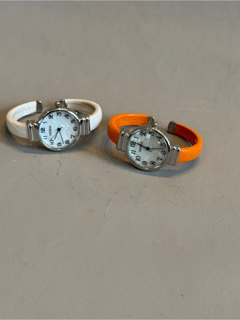 Geneva Women’s White and Orange Leather Cuff Watches NEW
